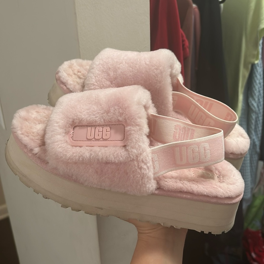 Pink fluffy UGG platforms